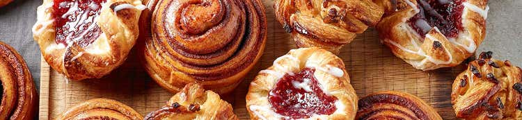 Assorted bakery pastries with fruit fillings, promoting Ingredion bakery ingredient solutions